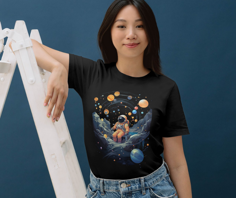 Astronaut with solar system T-shirt
