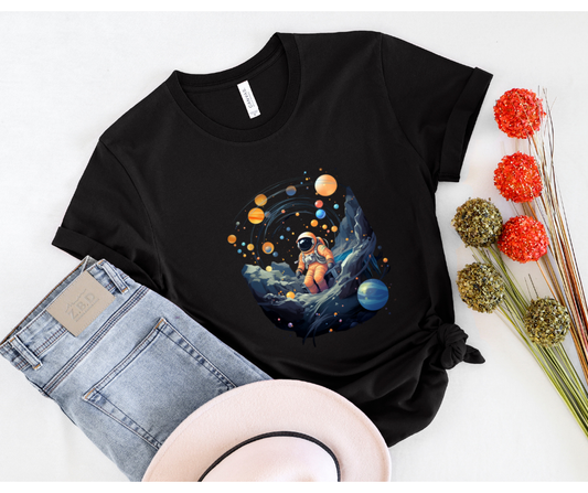 Astronaut with solar system T-shirt