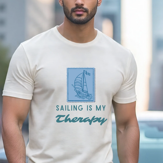 Man wearing a t-shirt with 'Sailing is my Therapy' design in an urban setting