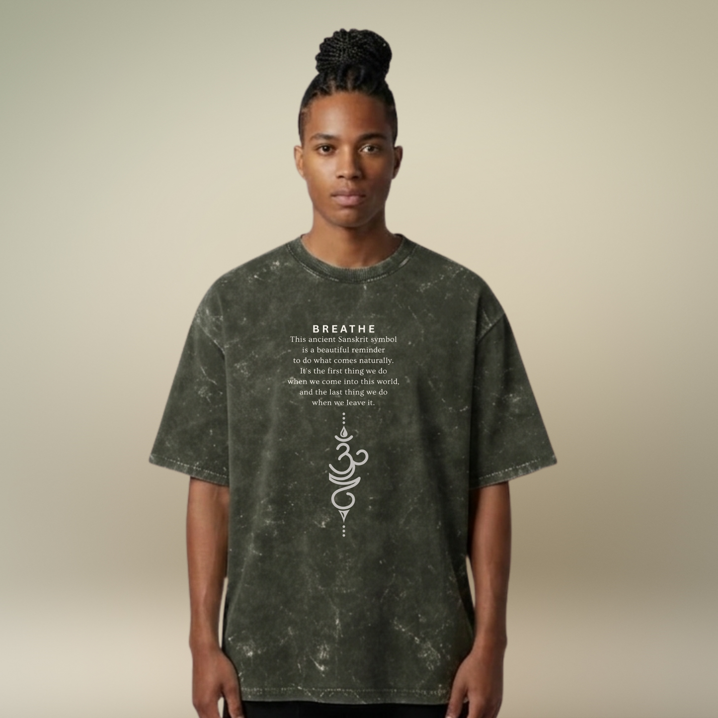Person wearing a dark green t-shirt with text and design on a beige background