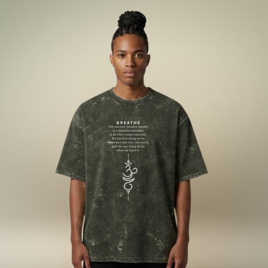 Person wearing a dark green t-shirt with text and design on a beige background