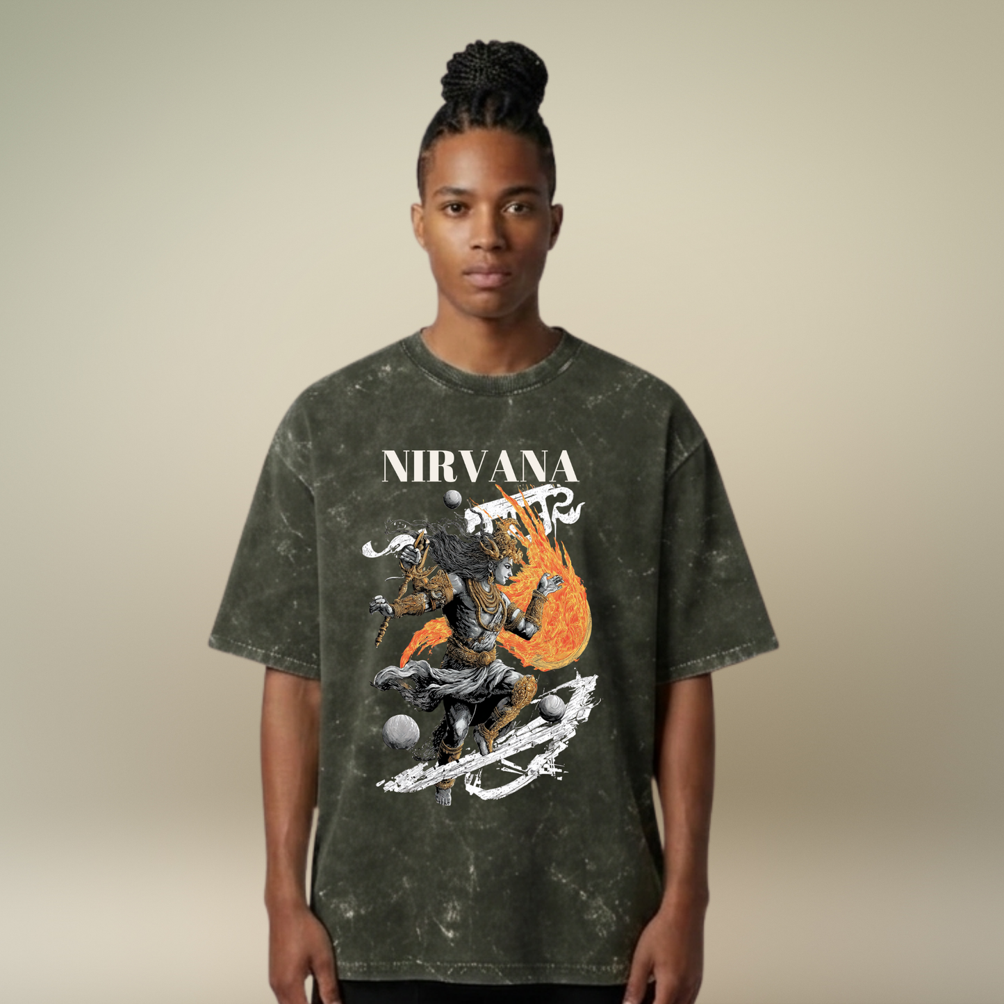 Person wearing a Nirvana t-shirt with a graphic design on a beige background